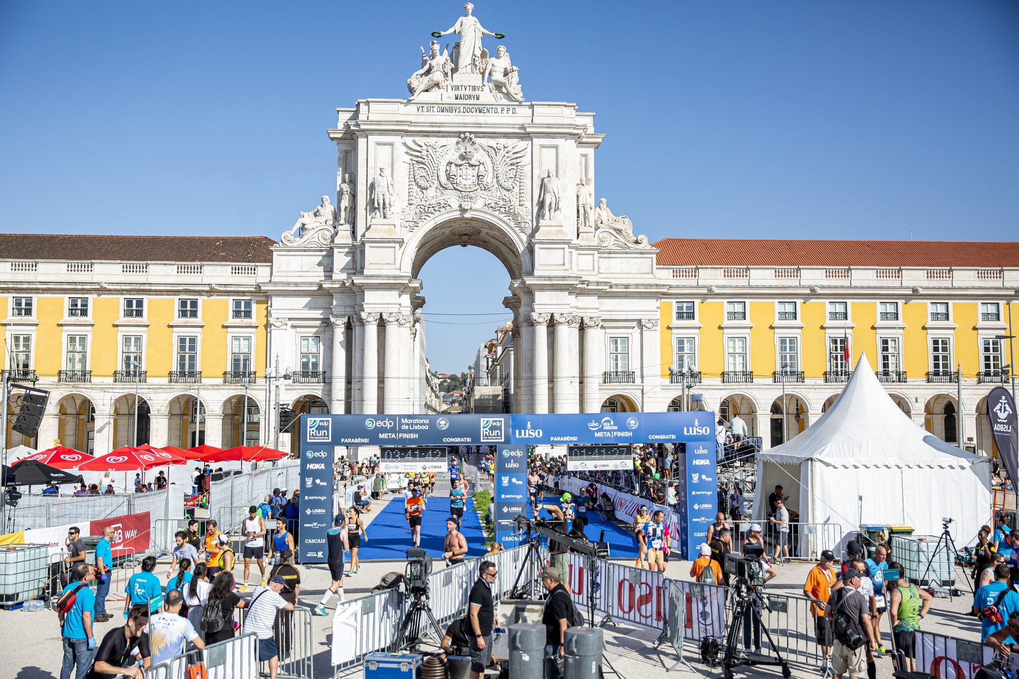 A runner crossing the finish line
